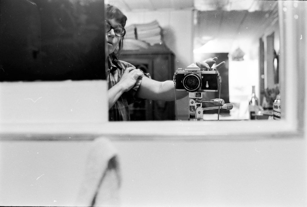 Jay DeFeo, Self-Portrait with Camera, Larkspur Studio, CA, 1972