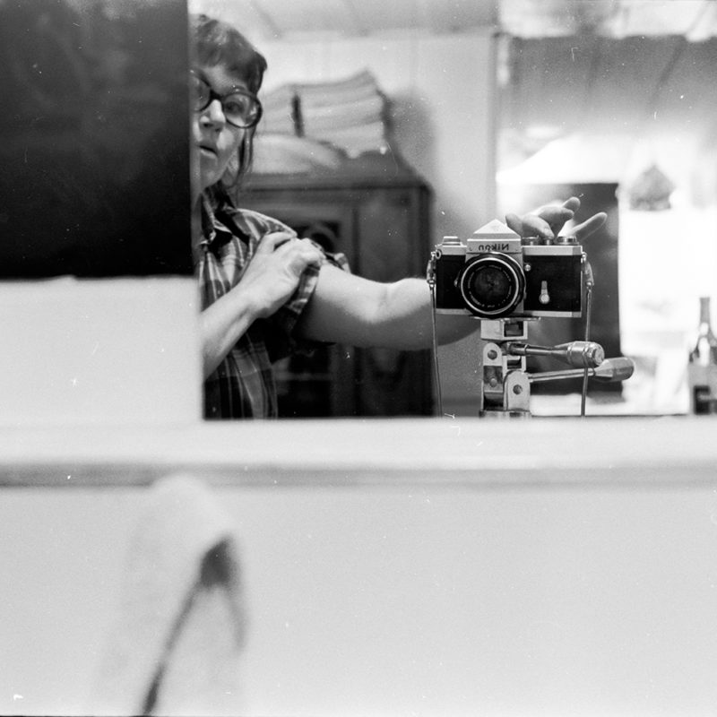 Jay DeFeo, Self-Portrait with Camera, Larkspur Studio, CA, 1972